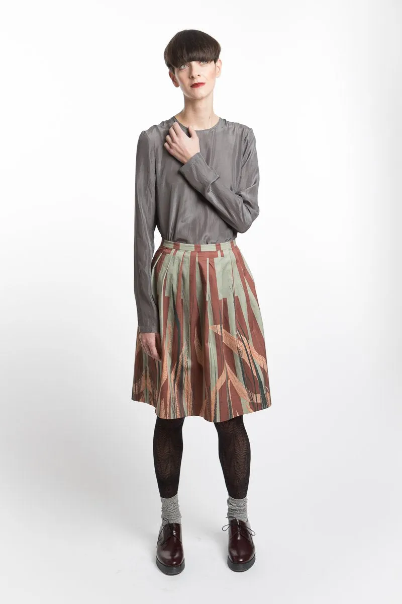 Pleated skirt with leave print