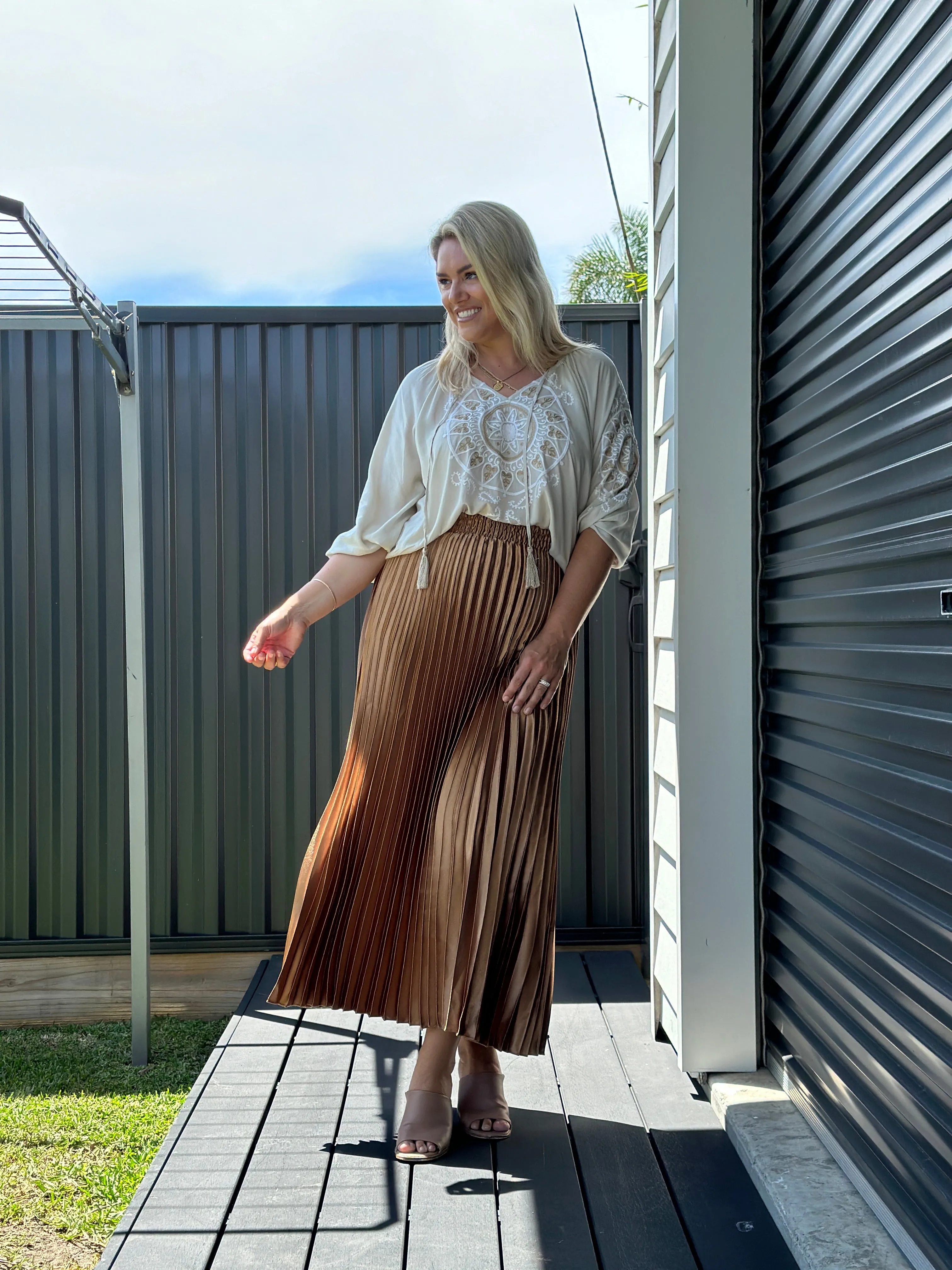 THE LONG PLEATED SKIRT