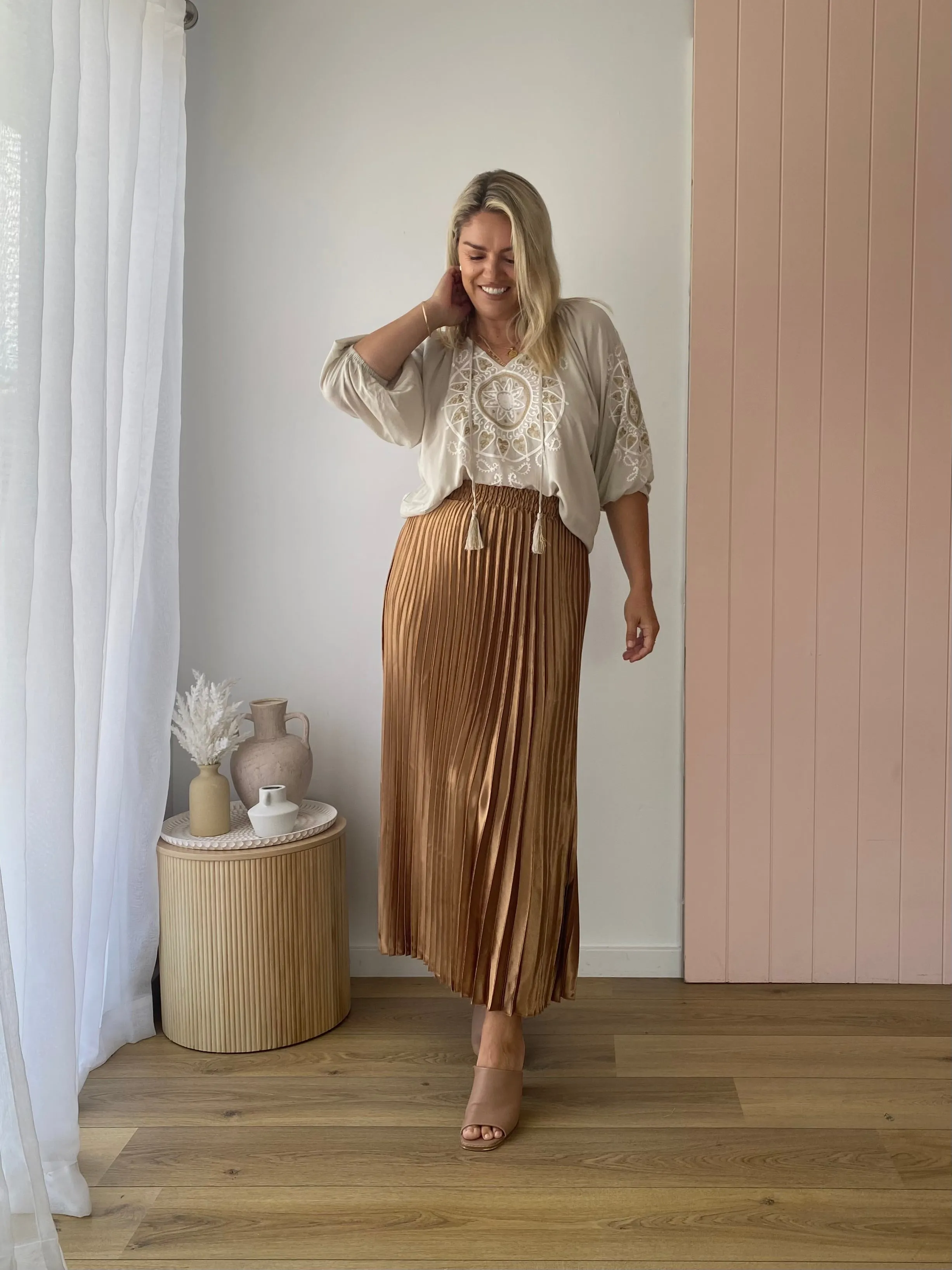 THE LONG PLEATED SKIRT