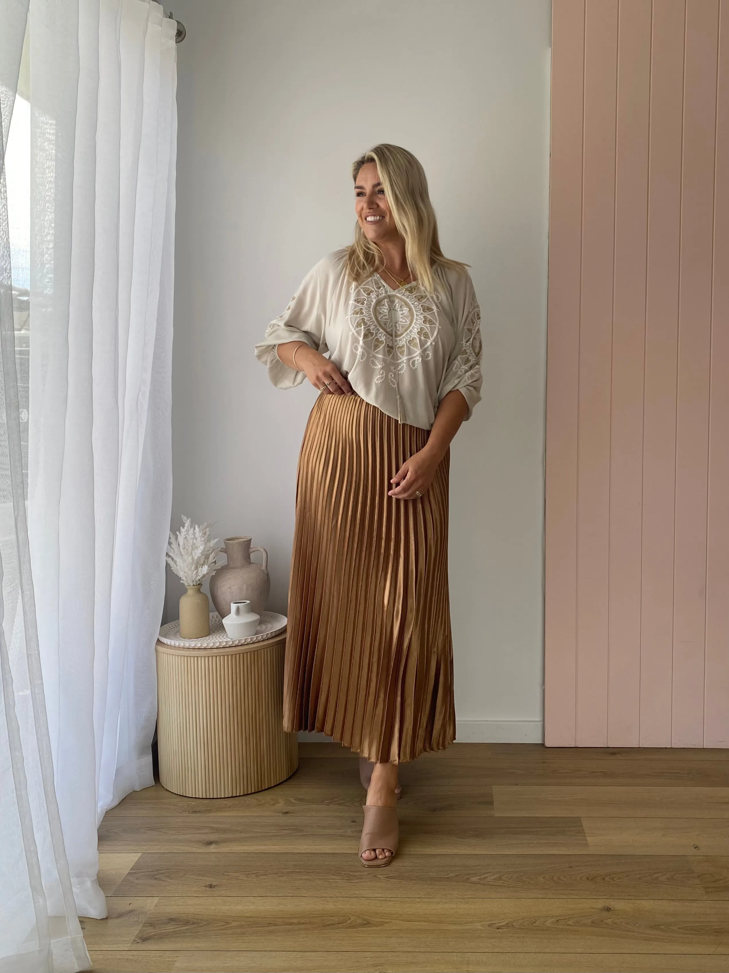 THE LONG PLEATED SKIRT