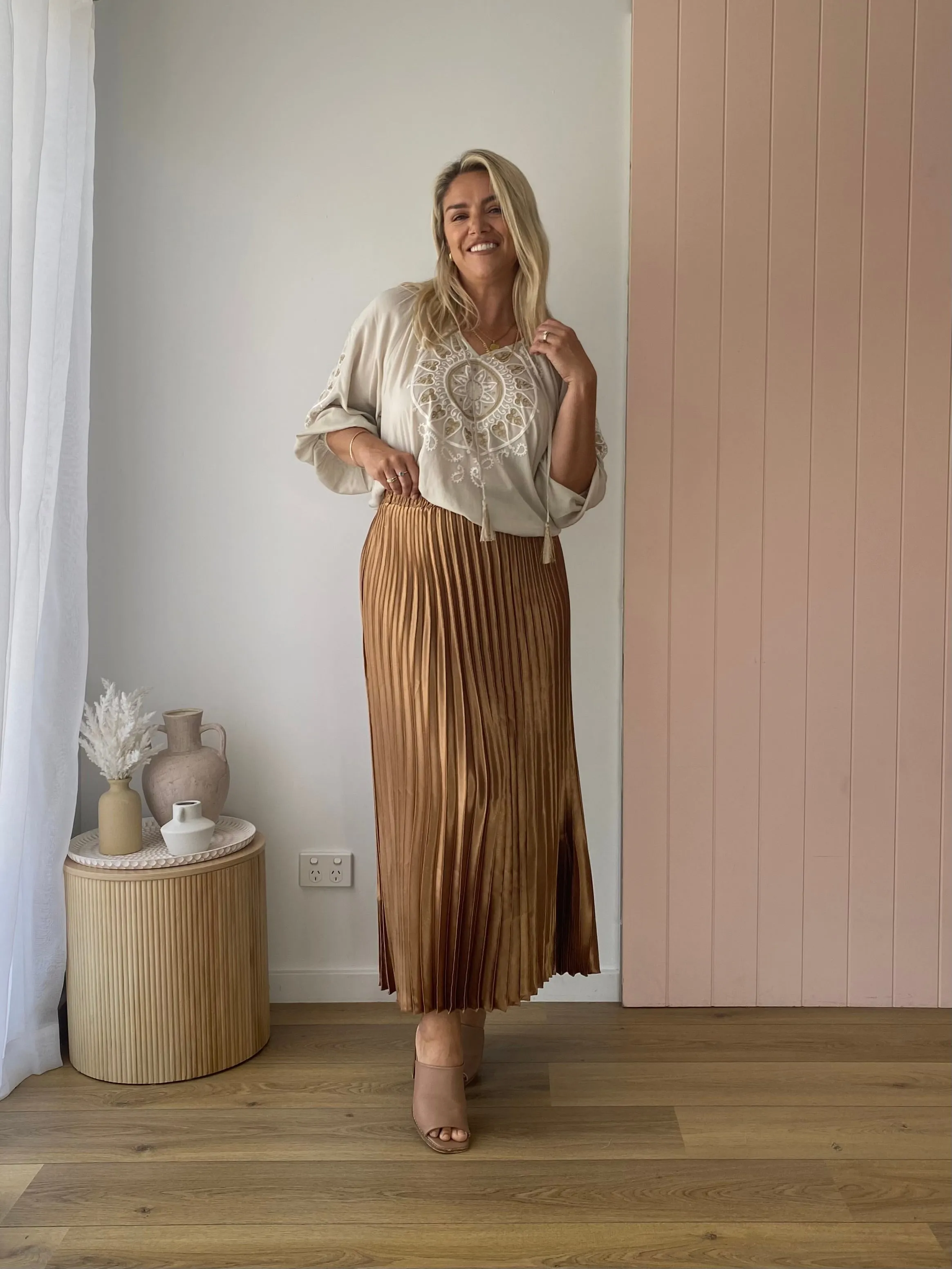 THE LONG PLEATED SKIRT