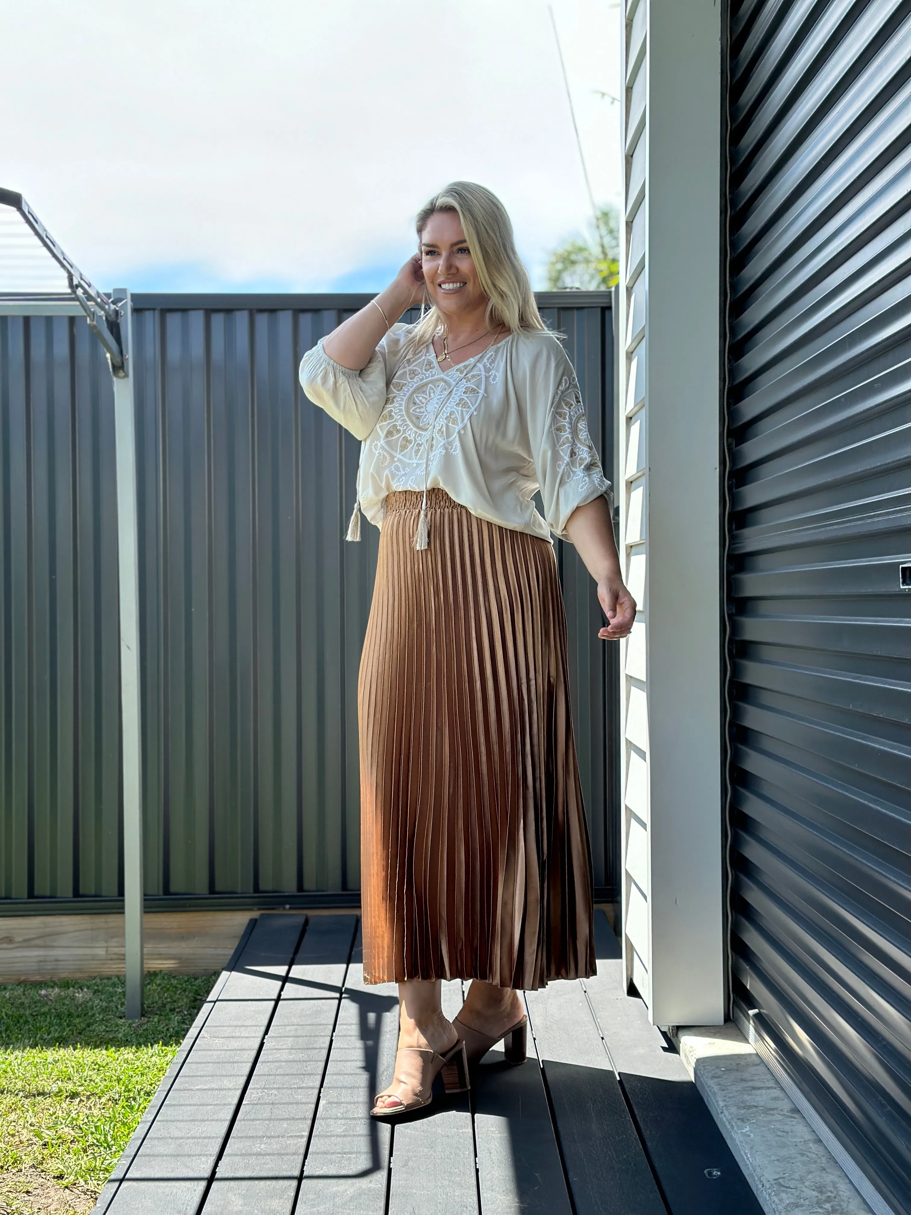 THE LONG PLEATED SKIRT